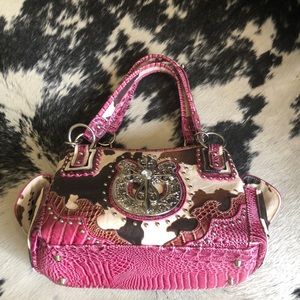 Cow print and pink snakeskin purse